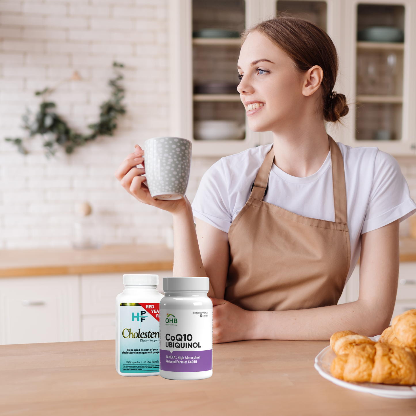 beautiful-woman-kitchen-apron-with-coffee-croissant-enjoys-her-morning-CHOLESTERL